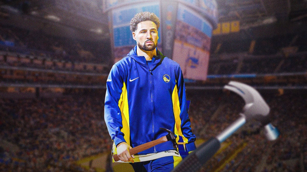Warriors' Klay Thompson holding a hammer