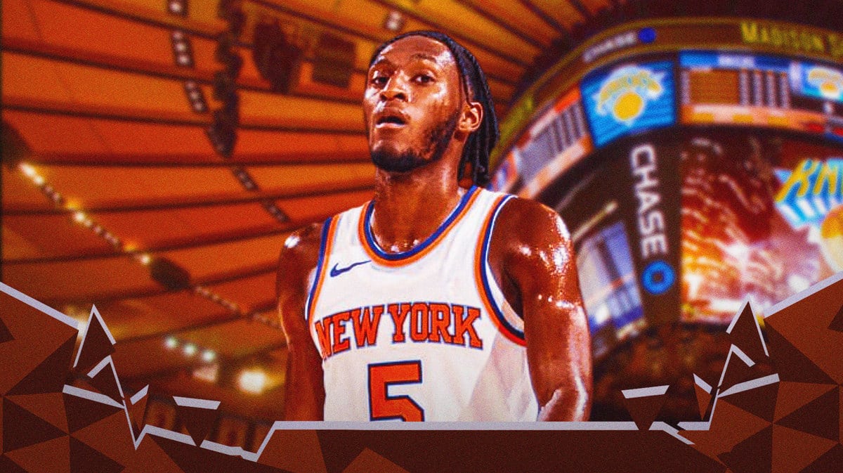 The Knicks' Immanuel Quickley looking upset in front of Madison Square Garden