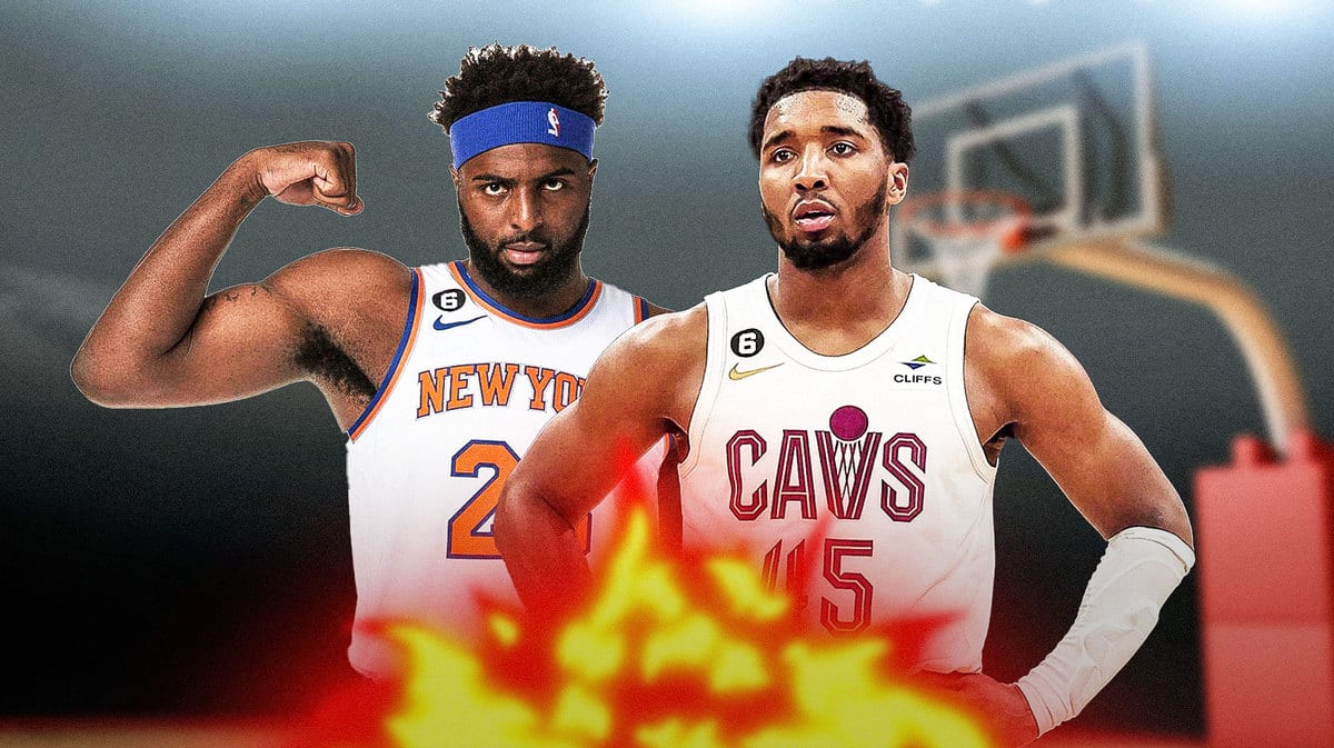 Mitchell Robinson celebrates in front of Donovan Mitchell