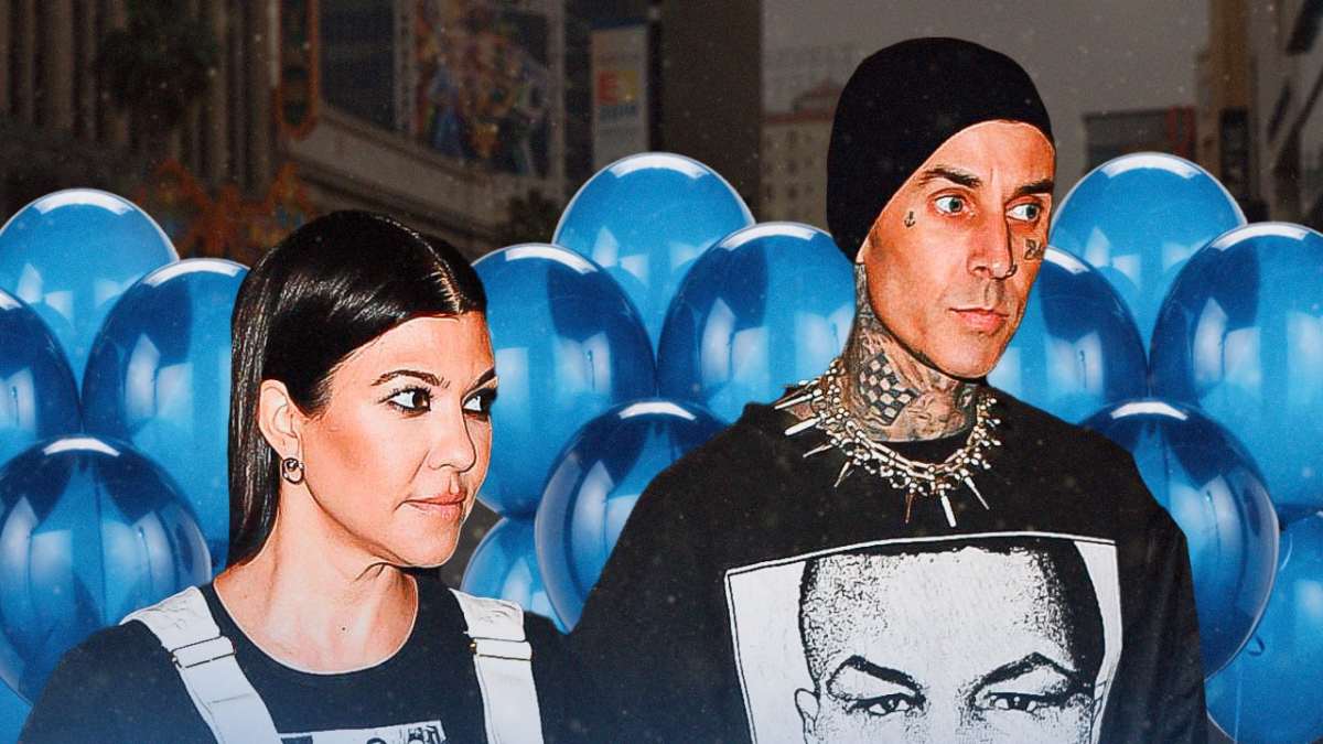 Travis Barker and Kourtney Kardashian with blue balloons behind them