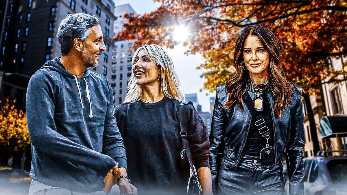 Kyle Richards, Mauricio Umansky and Emma Slater holding hands