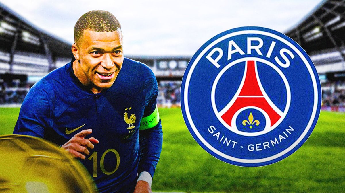 Kylian Mbappe laughing in front of the PSG logo