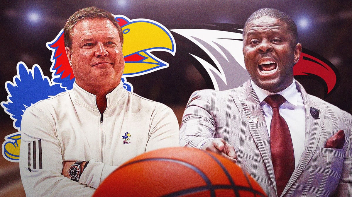 Kansas coach Bill Self, North Carolina Central coach Lavelle Morton, basketball court in background