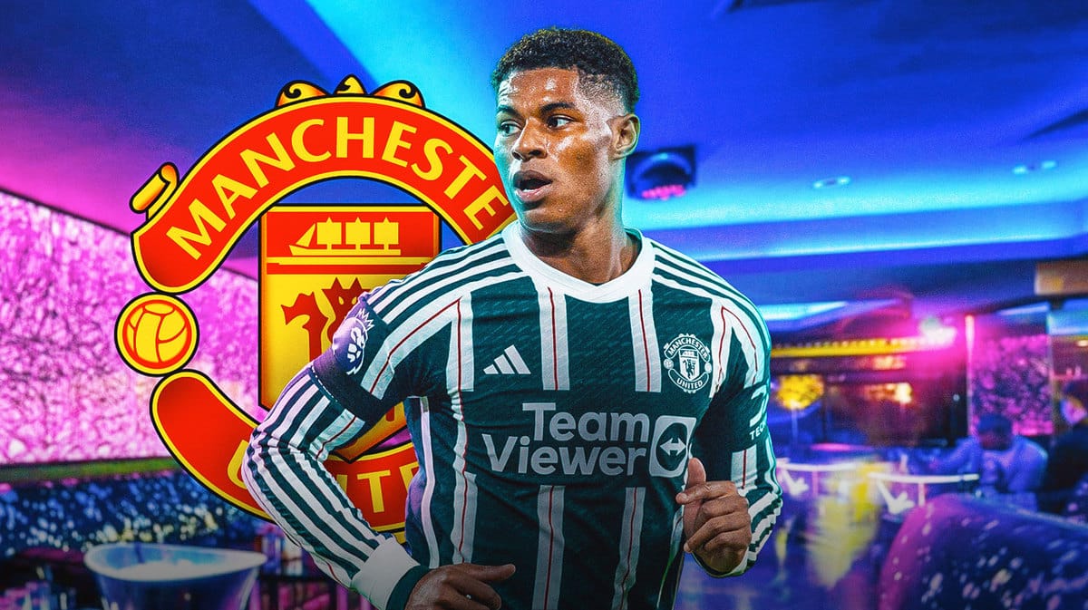 Marcus Rashford in a club, the Manchester United logo on the wall