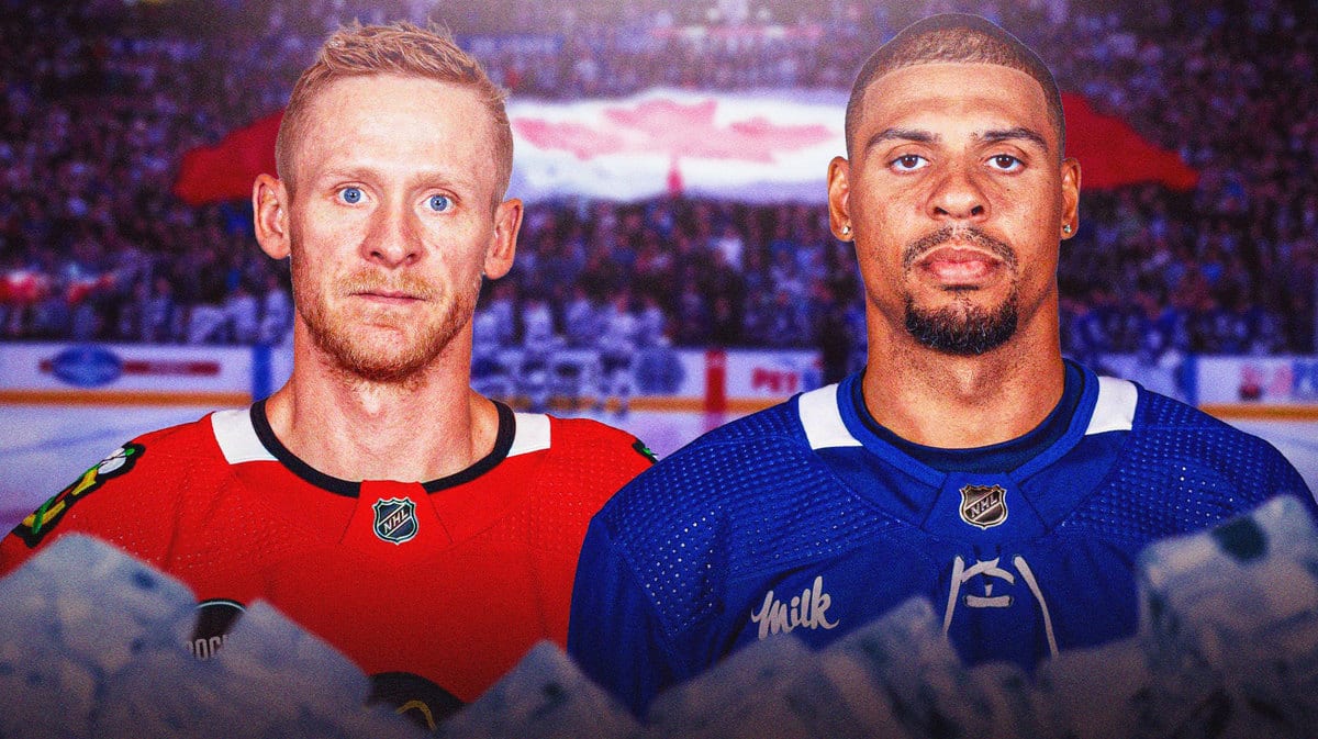 Toronto Maple Leafs forward Ryan Reaves next to Chicago Blackhawks forward Corey Perry with the Maple Leafs' home rink in the background