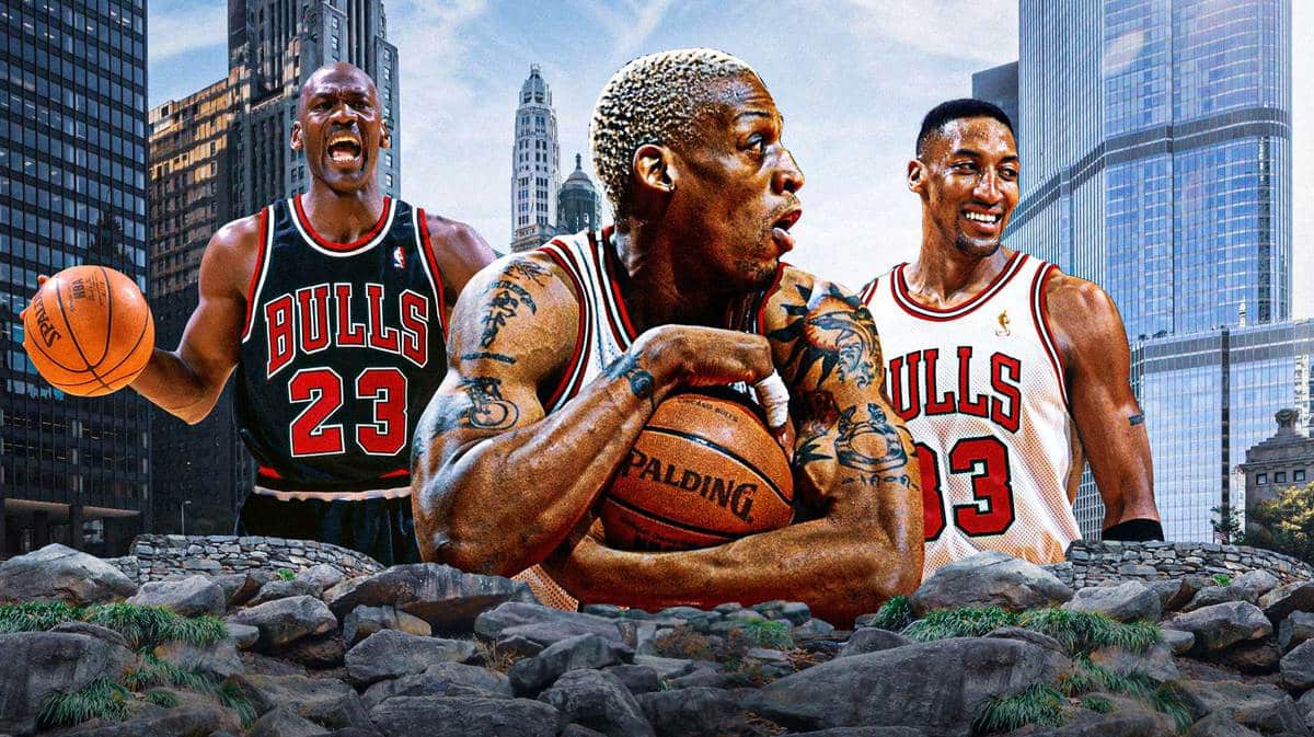 Dennis Rodman of the Bulls in between Michael Jordan and Scottie Pippen