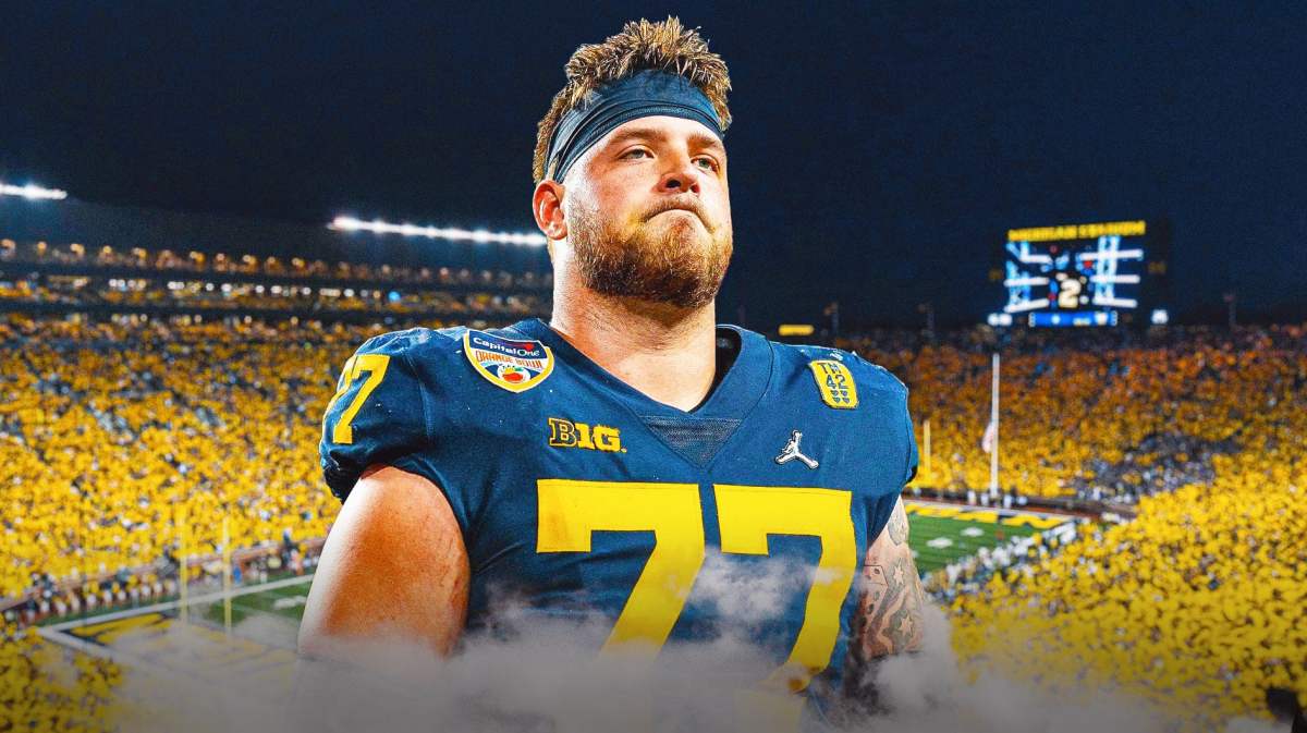 Michigan football, Michigan State football, Wolverines, Spartans, Trevor Keegan, Trevor Keegan with Michigan football stadium in the background