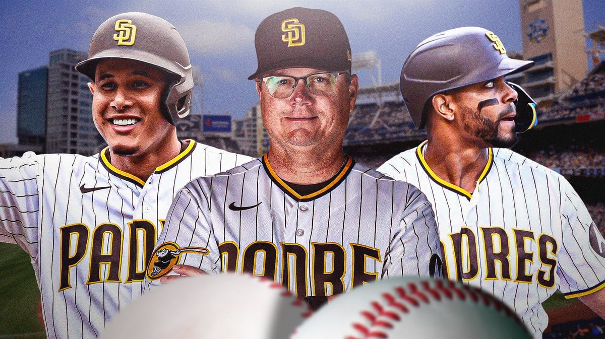 Mike Shildt in Padres gear in the front. Manny Machado, Xander Bogaerts behind him, Padres manager search
