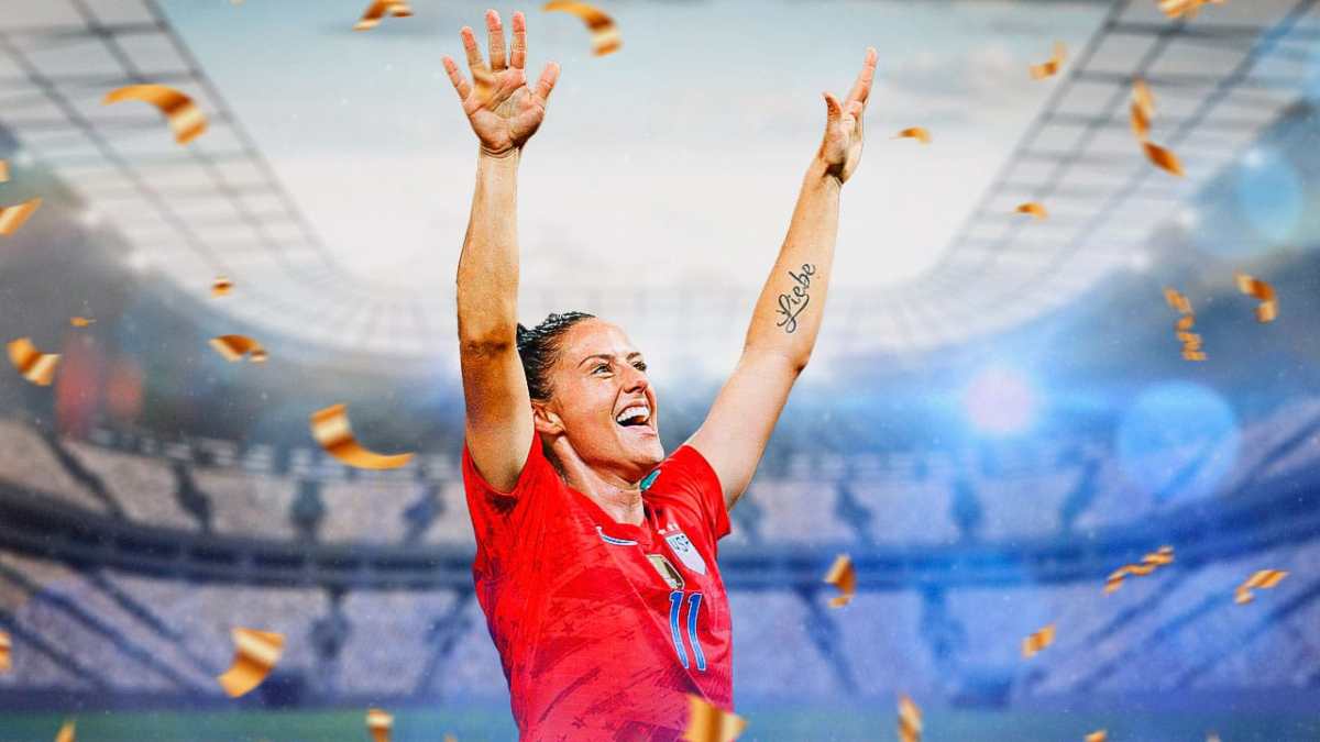 Ali Krieger celebrating on a soccer pitch