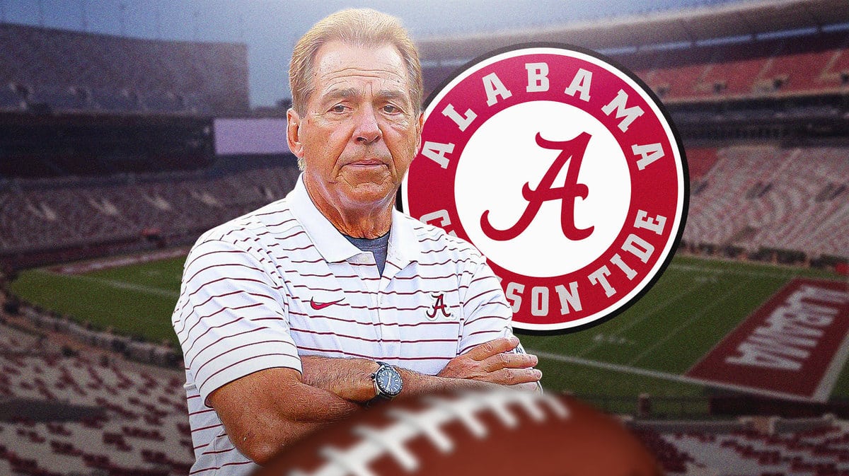 Alabama football head coach Nick Saban in front of Bryant-Denny stadium.