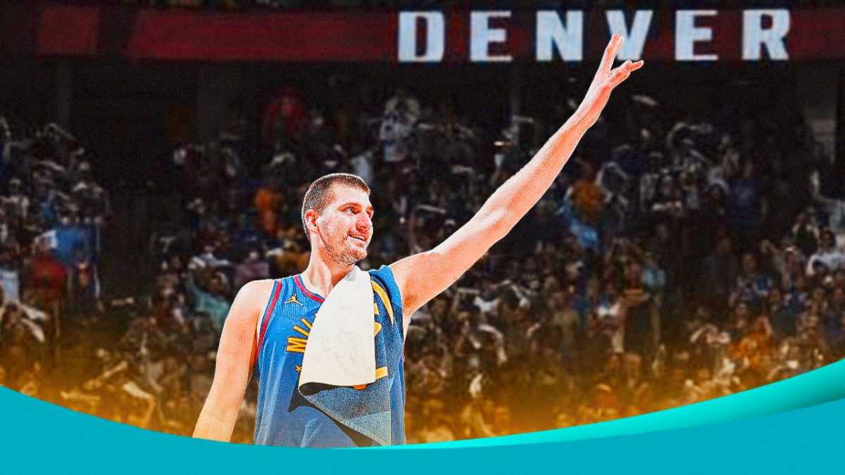 Nikola Jokic waving to Nuggets fans
