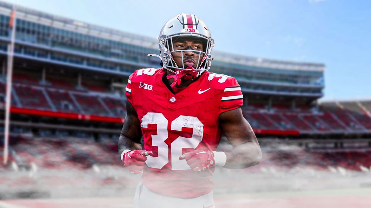 Ohio State running back TreVeyon Henderson takes the field