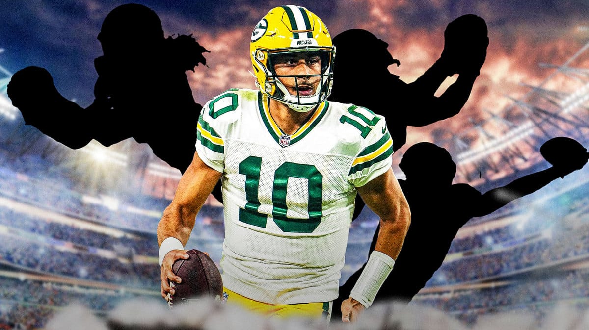 Jordan Love of the Packers with three mystery players around him