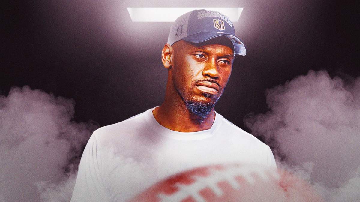 Raiders' Chandler Jones looking serious in a dark room.