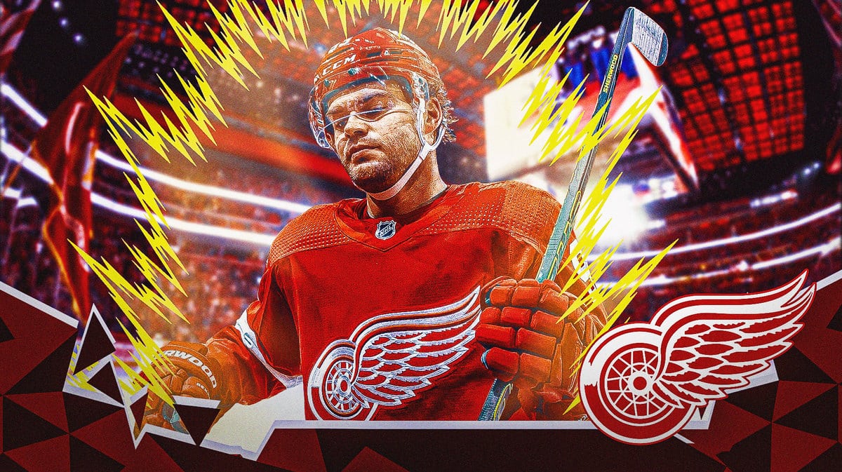 Detroit Red Wings star Alex DeBrincat with a Super Saiyan aura around him and Little Caesars Arena in the background