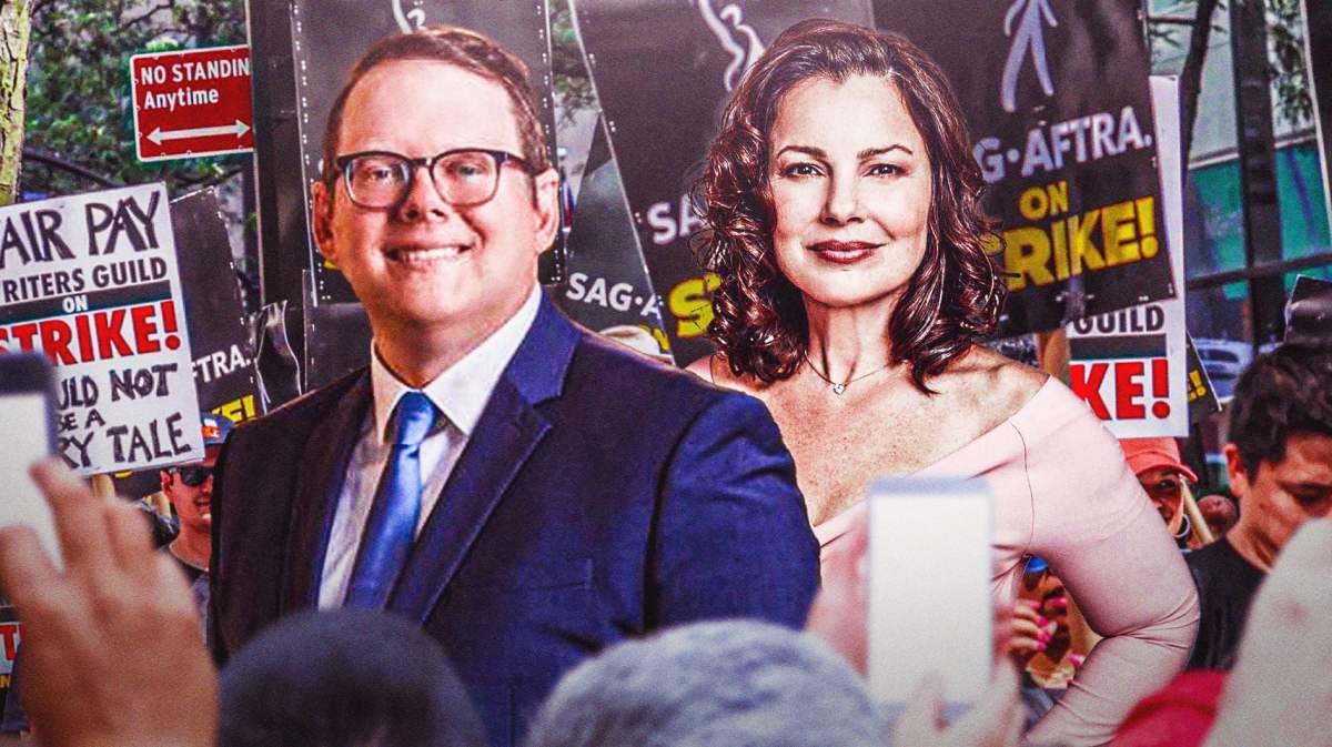 Duncan Crabtree-Ireland and Fran Drescher with SAG-AFTRA strikers in background.