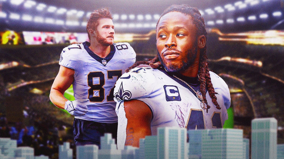 New Orleans Saints running back Alvin Kamara and tight end Foster Moreau in front of the Caesars Superdome.