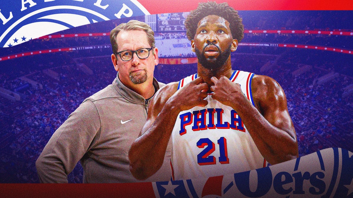 Sixers coach Nick Nurse next to Joel Embiid