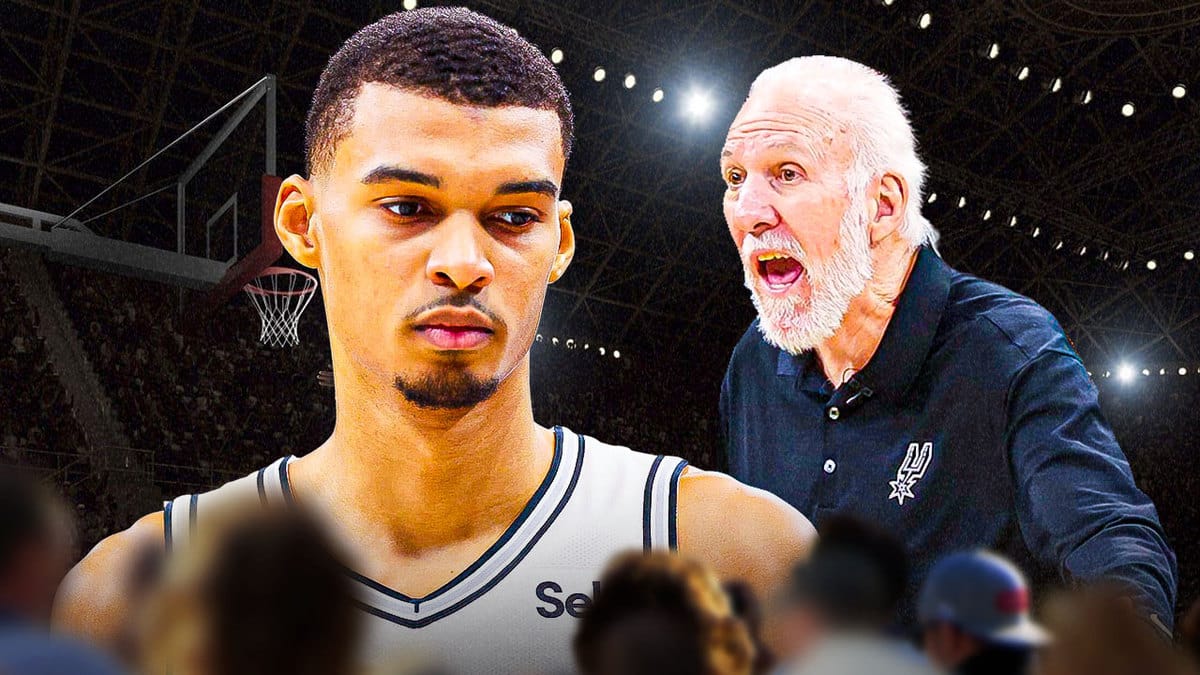 Spurs' Victor Wembanyama looking apologetic, with Gregg Popovich yelling at him