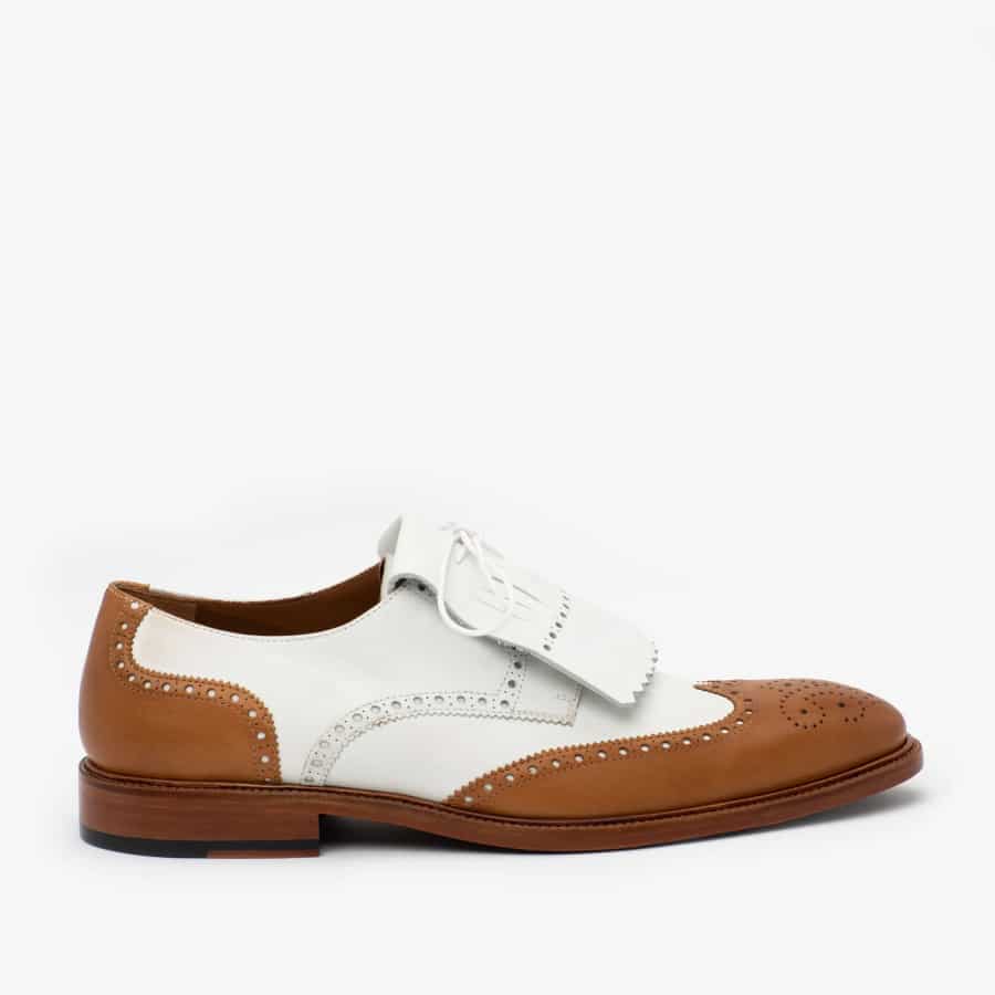 TAFT Spectator Shoe - Honey/white colored on a light gray background.