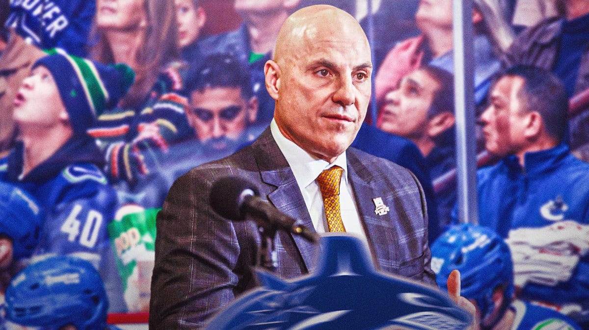 Rick Tocchet, Vancouver Canucks head coach is behind the bench