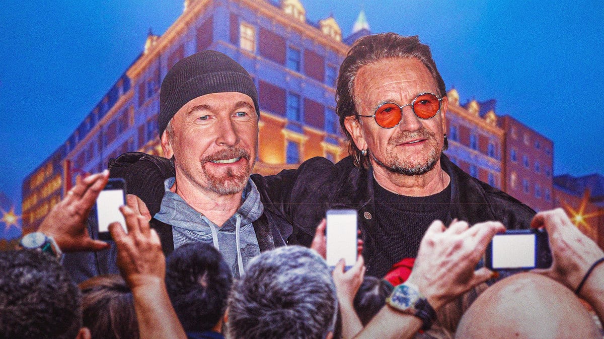 U2 members The Edge and Bono in front of the Clarence Hotel