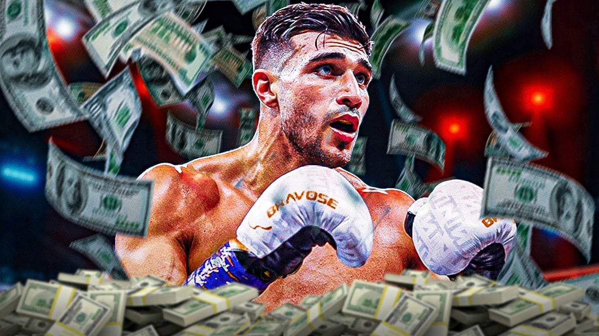 Tommy Fury surrounded by piles of cash.