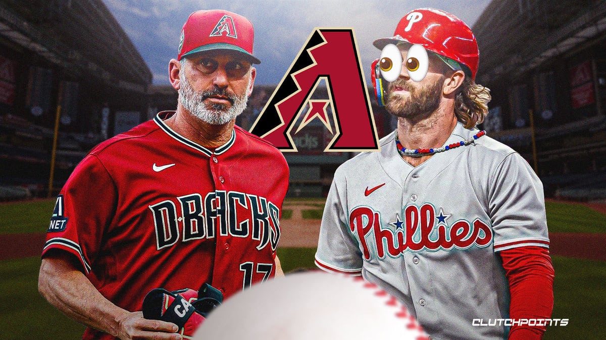 Diamondbacks Torey Lovullo taunting Phillies Bryce Harper. Background is Chase Field