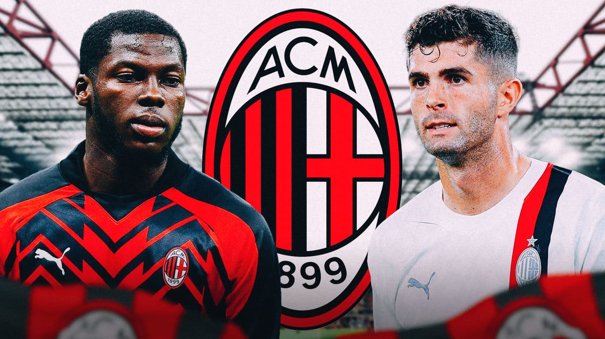Christian Pulisic and Yunus Musah looking down/sad in front of the AC Milan logo USMNT