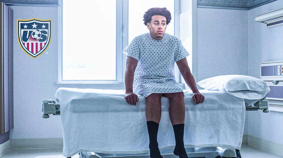 Tyler Adams sitting in a hospital, the USMNT logo on the wall