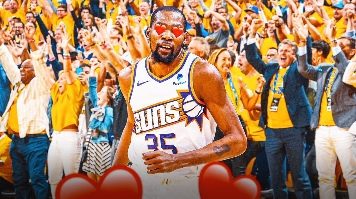 Phoenix Suns forward Kevin Durant with Golden State Warriors fans in the background.
