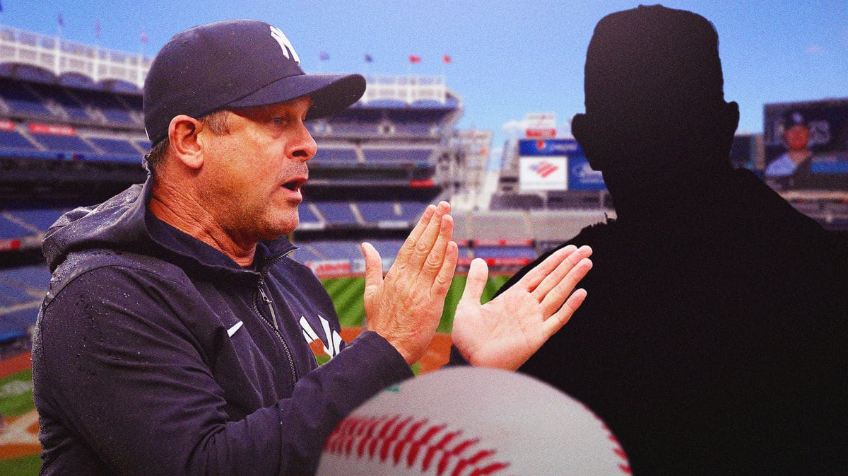 Aaron Boone with Sean Casey as a silhouette next to him.