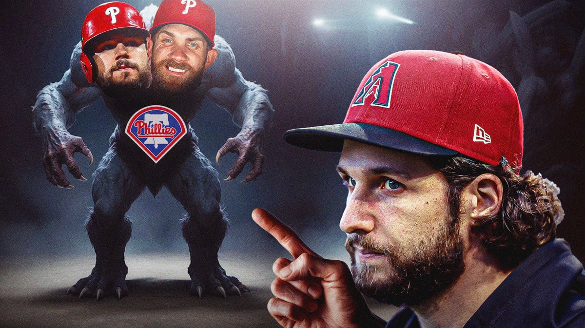 Diamondbacks' Zac Gallen pointing at Kyle Schwarber, Bryce Harper.
