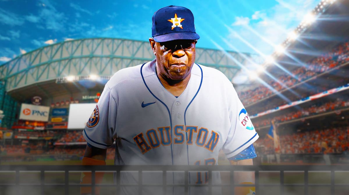 Dusty Baker with Minute Maid Park in the background.