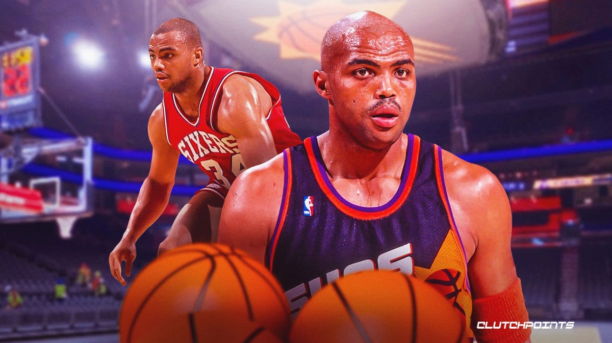 Charles Barkley wearing both 76ers and Suns jerseys