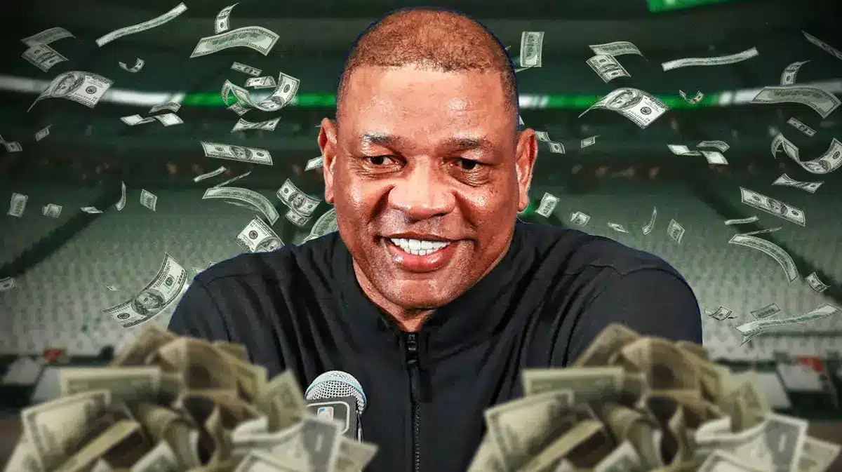 Doc Rivers surrounded by piles of cash.