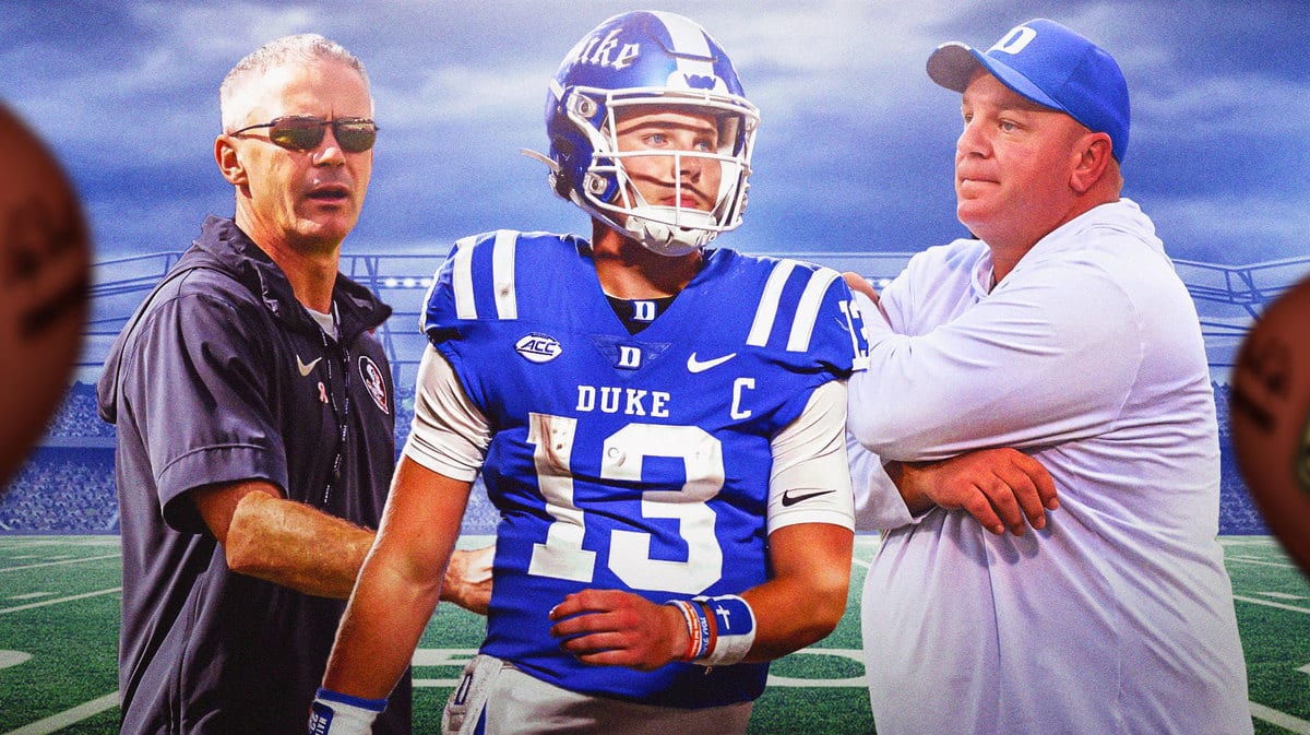 Duke football HC Mike Elko looking at Riley Leonard with Florida State HC Mike Norvell