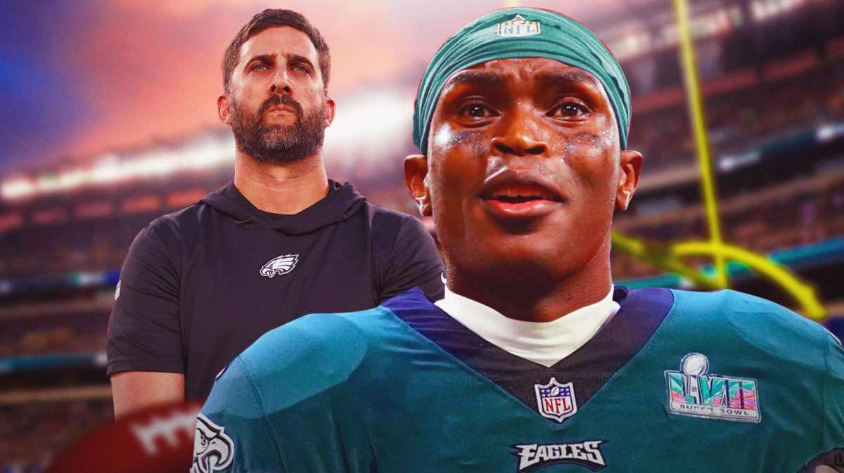 Eagles' Nick Sirianni looking serious. Julio Jones next to him in an Eagles jersey.