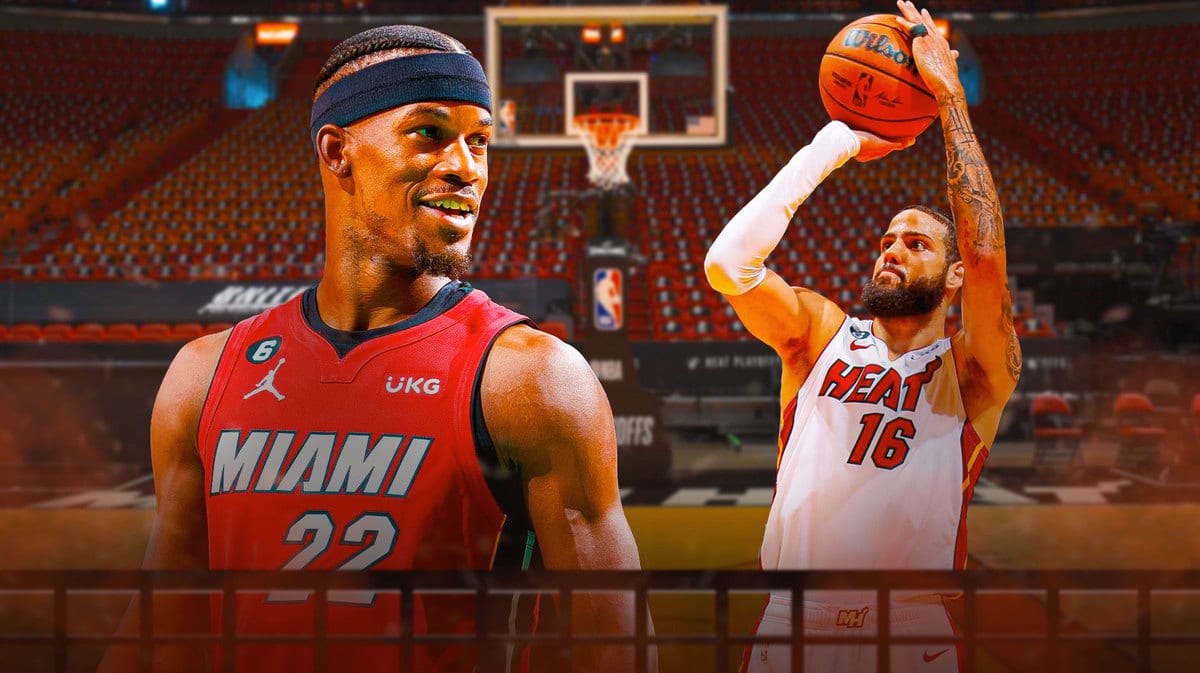 Heat’s Caleb Martin shooting a basketball. Heat’s Jimmy Butler smiling
