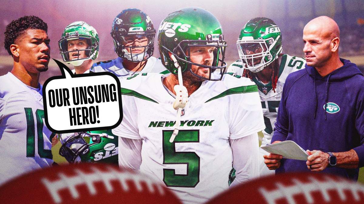 Jets teammates looking at punter Thomas Morstead after they beat the Giants.
