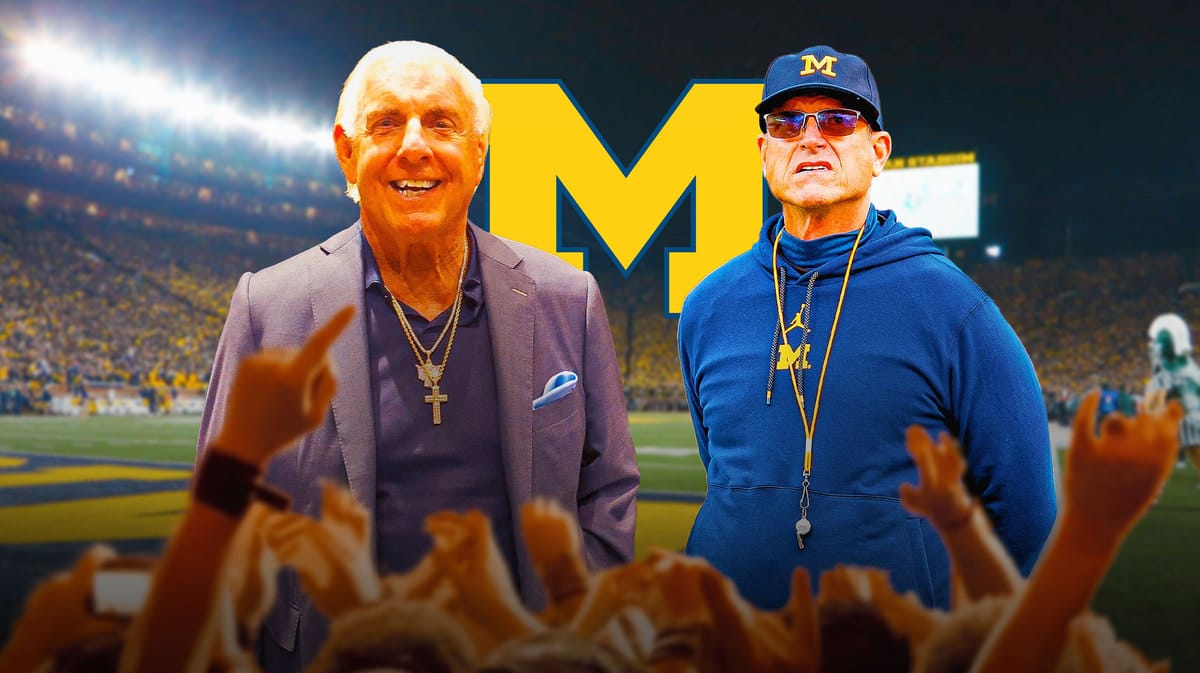 Ric Flair is standing behind Michigan football HC Jim Harbaugh