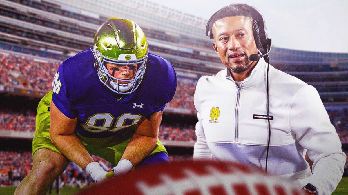 Notre Dame football tight end Mitchell Evans hurt and looking at head coach Marcus Freeman.
