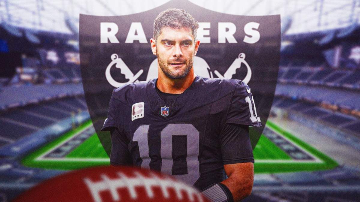 Raiders Jimmy Garoppolo in front of a Raiders logo at Allegiant Stadium