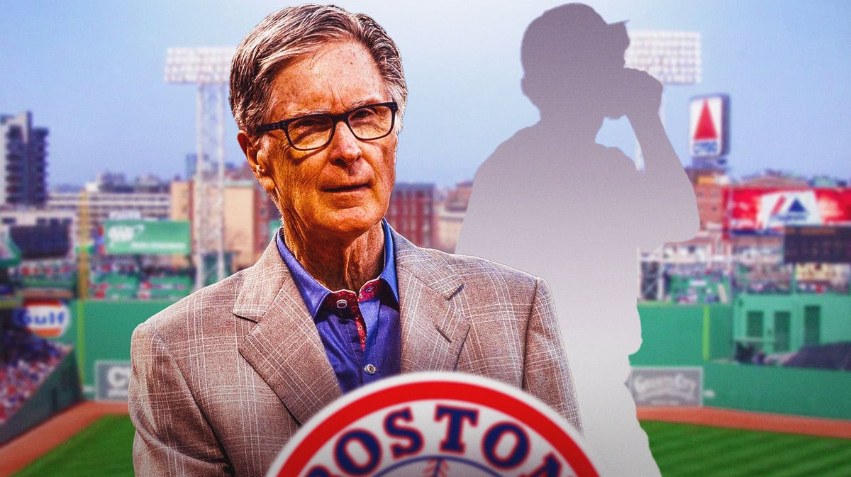 John Henry, Craig Breslow next to him with Fenway Park as the background.