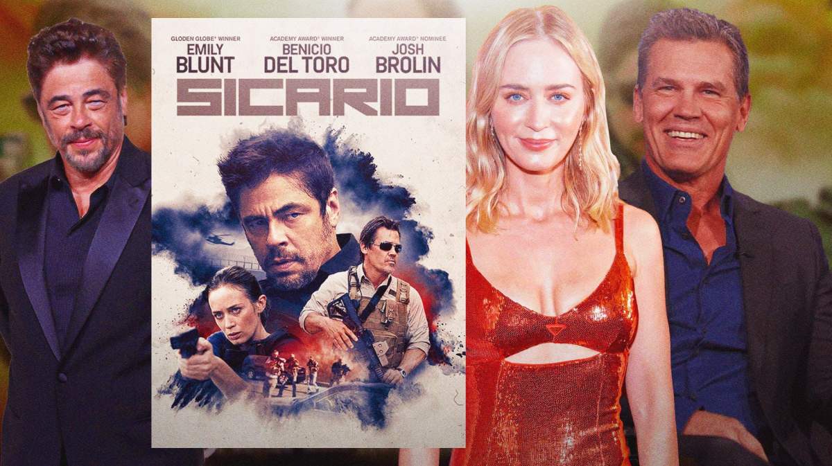 Benicio del Toro, Emily Blunt, and Josh Brolin in front of the Sicario poster.