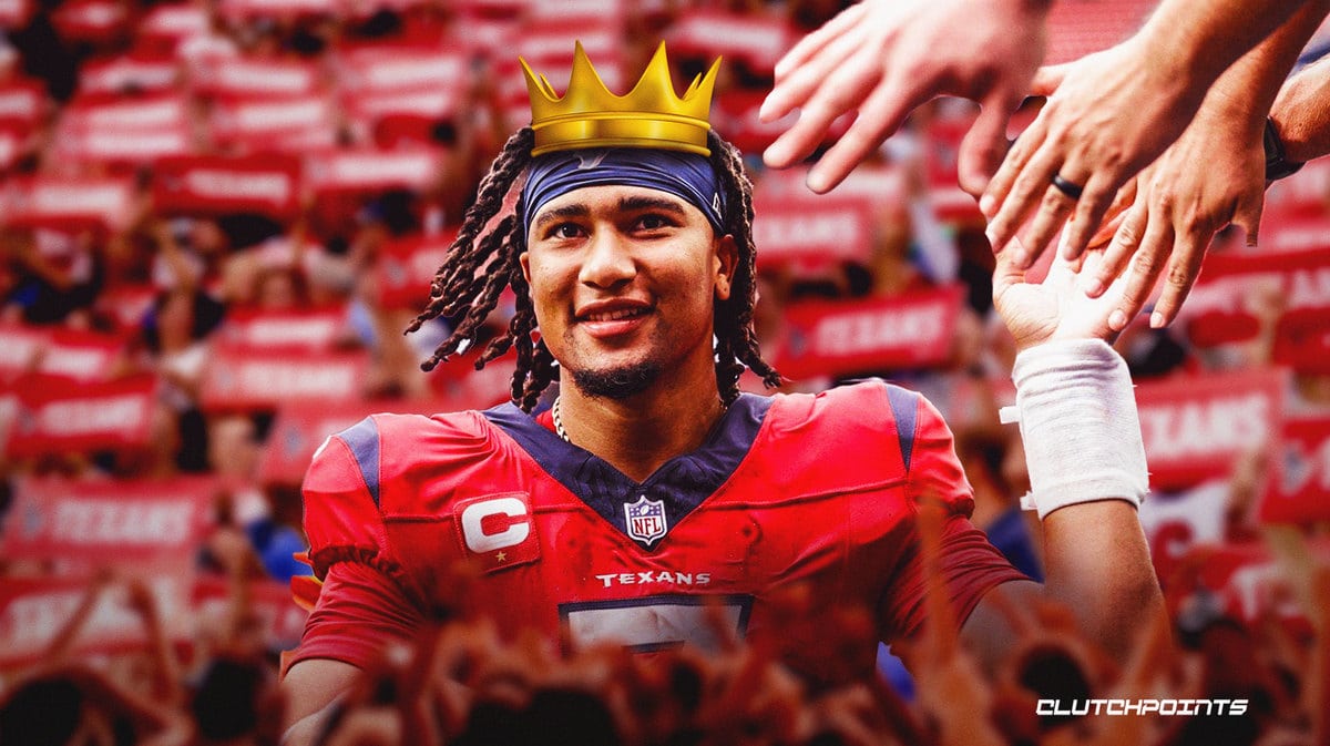 C.J. Stroud with a crown on his head and giving high-fives.