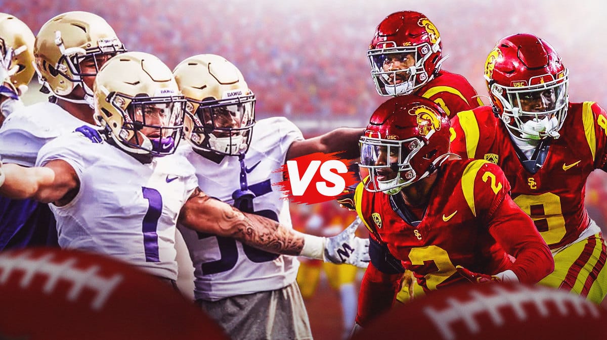 Washington Huskies football players on the left, and USC football players on the right, face off.