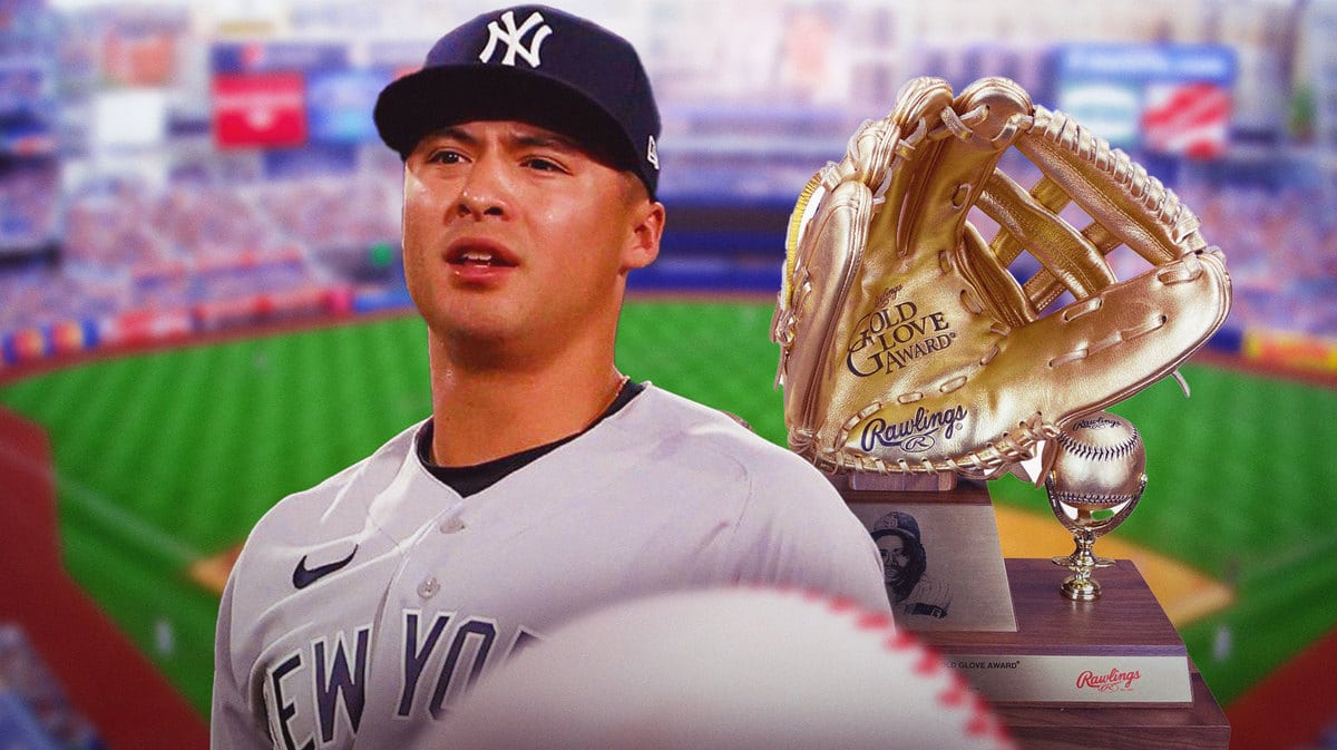 Anthony Volpe with a Gold Glove Award trophy next to him