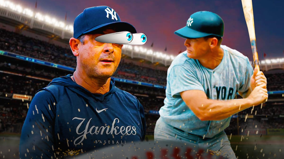 New York Yankees manager Aaron Boone and Mickey Mantle.