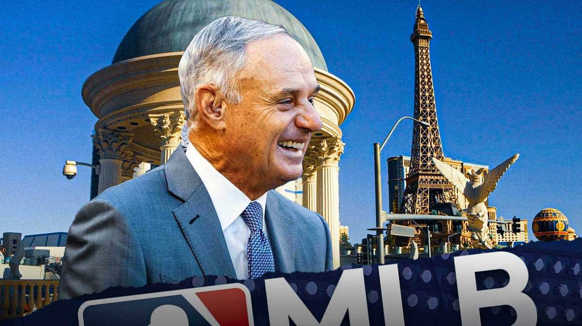 MLB commissioner Rob Manfred, Jr. with the Eiffel Tower in the background.